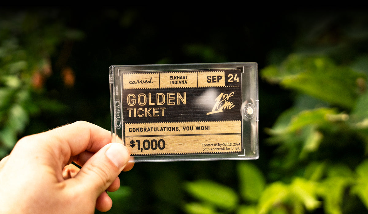 Hand holding Golden Ticket