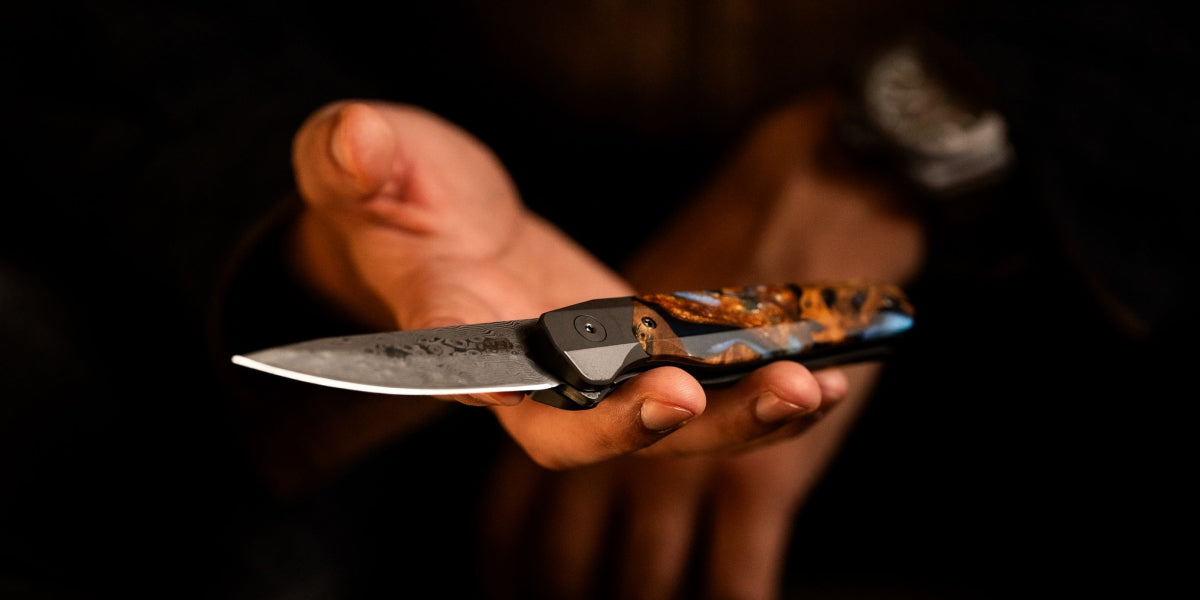 Carved Live Edge Knife in someones hand